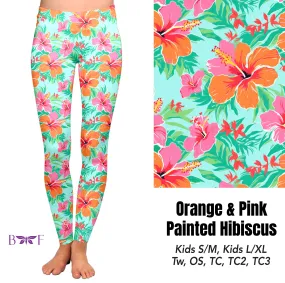 Orange and Pink painted hibiscus capris, shorts and skorts with pockets